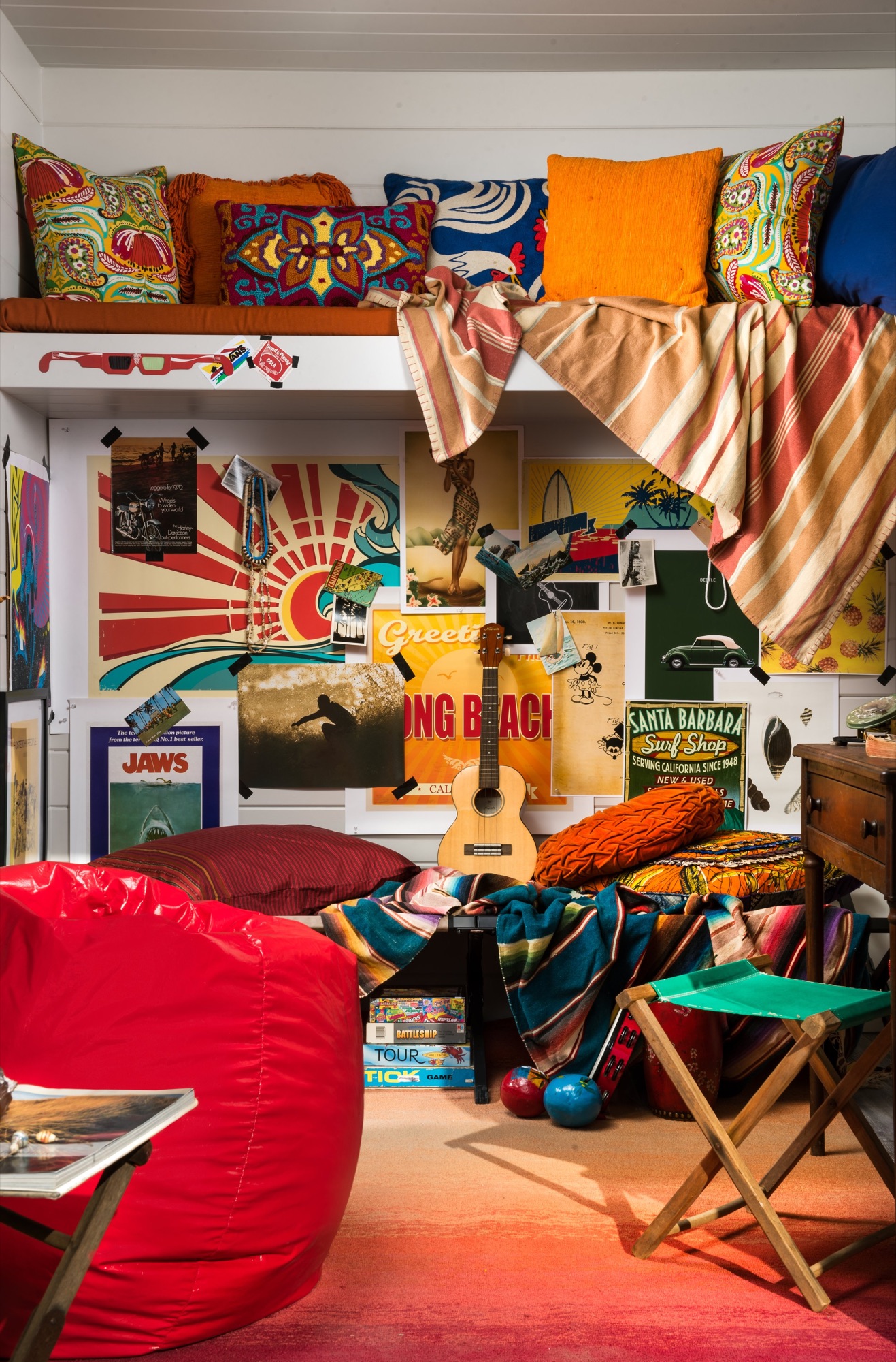 Colorful textiles and lanterns inside the Boho Beach House playhouse